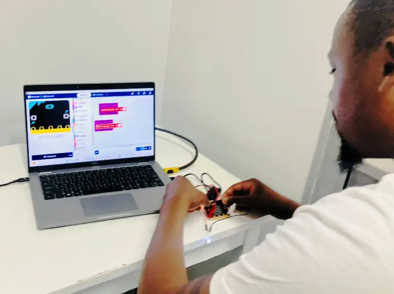 Empowering Coaches through Robotics Training in South Africa